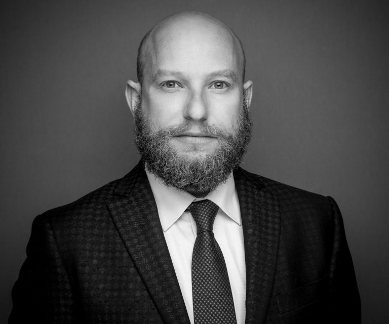 Headshot of Gil Fischler